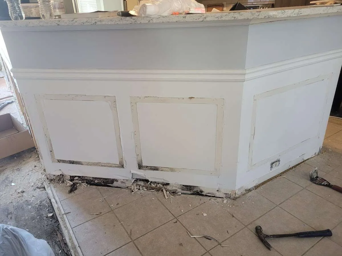 Water damage and mold on kitchen during Storm Damage Restoration in Huntertown